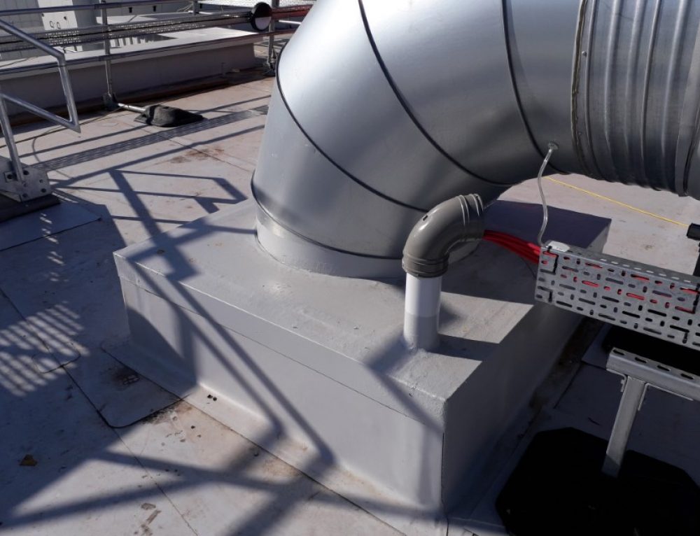 Ducts pipe work through a flat roof Aperture